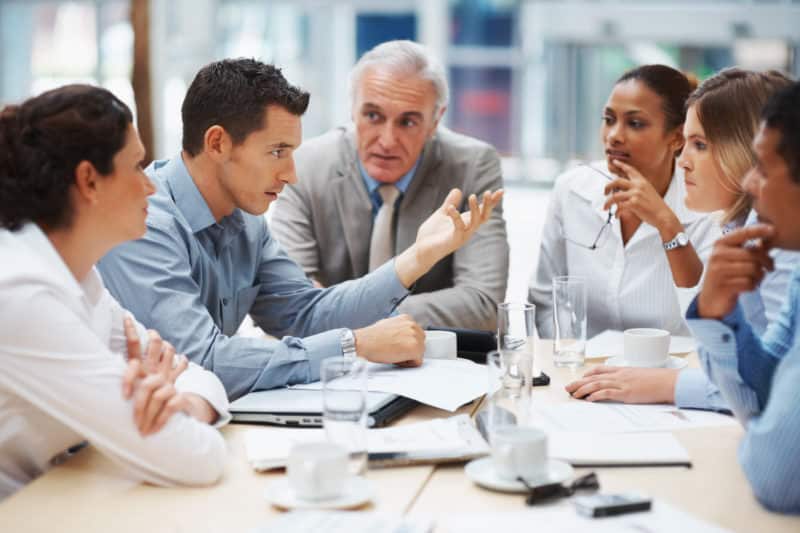 People talking around a table