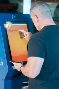 Man at a Bitcoin ATM