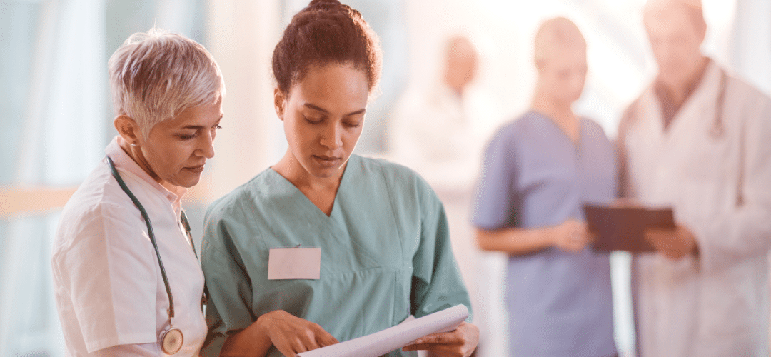 Doctor and nurses looking at a piece of paper